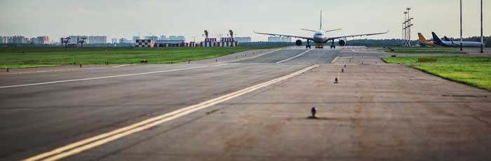 jet airliner taking off - long shot down the runway